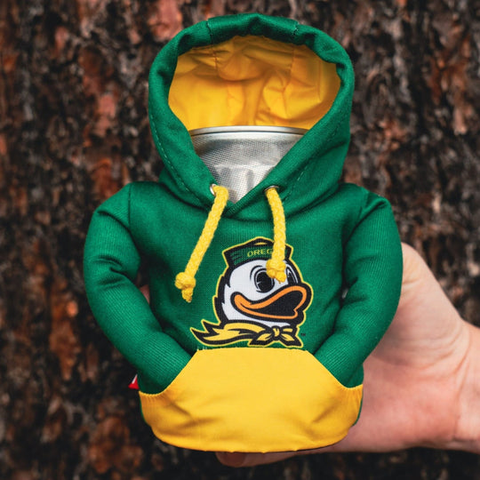 UO Duckhead Hoodie in hand #color_green-yellow